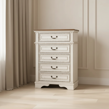 Realyn Chest of Drawers
