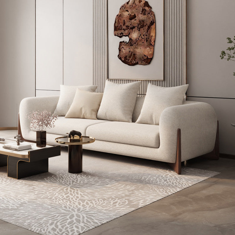 كنبة بثلاثة مقاعد من قماش بوقلي وإطار خشب سويدي