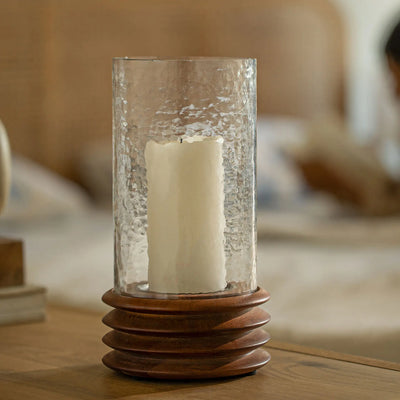 حامل شموع زجاجي وخشبي