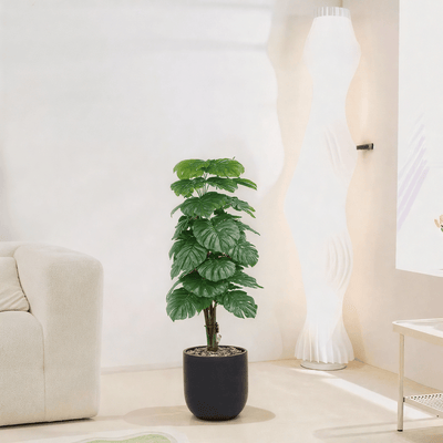 |Artificial Alocasia Heart Leaf Tree in a cylindrical plastic pot featuring large, symmetrical leaves. Number of branches: 1 Tub type: Durable plastic Tub shape: Cylindrical Available colors: black - Al Rugaib Furniture