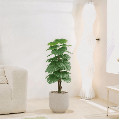 |Artificial Alocasia Heart Leaf Tree in a cylindrical plastic pot featuring large, symmetrical leaves. Number of branches: 1 Tub type: Durable plastic Tub shape: Cylindrical Available colors: torabi spray - Al Rugaib Furniture