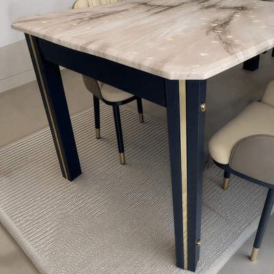 Elegant black dining table set with black and beige chairs. - Al Rugaib Furniture