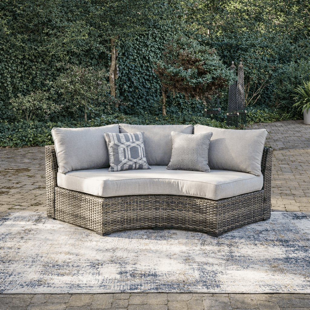 Harbor Court Curved Loveseat with Cushion Outdoor Sectionals| Ashley Homestore