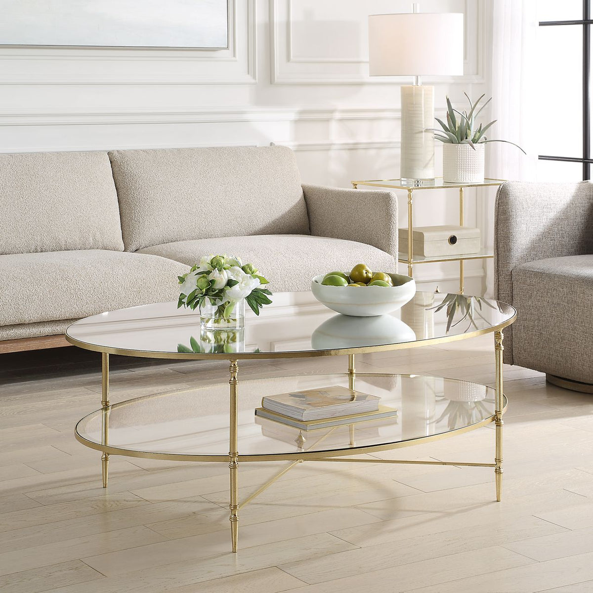 Henzler 93 W x 48 H x 134 D Champagne Oval Coffee Table with Mirror Top Coffee Tables| Uttermost