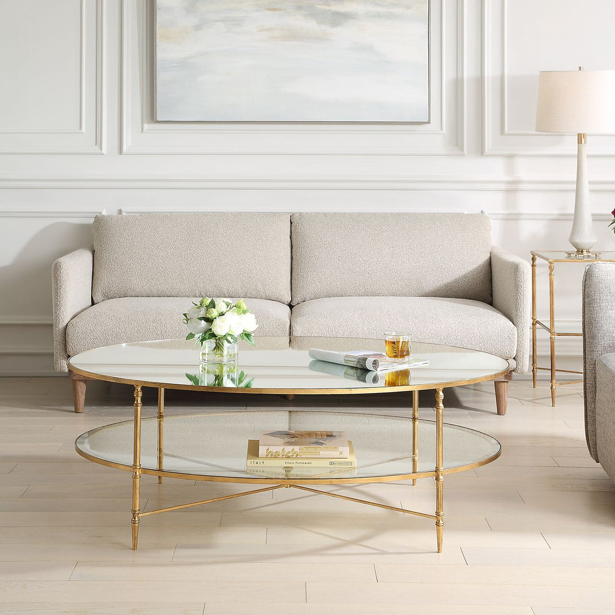 Henzler 93 W x 48 H x 134 D Gold Oval Coffee Table with Mirror Top Coffee Tables| Uttermost