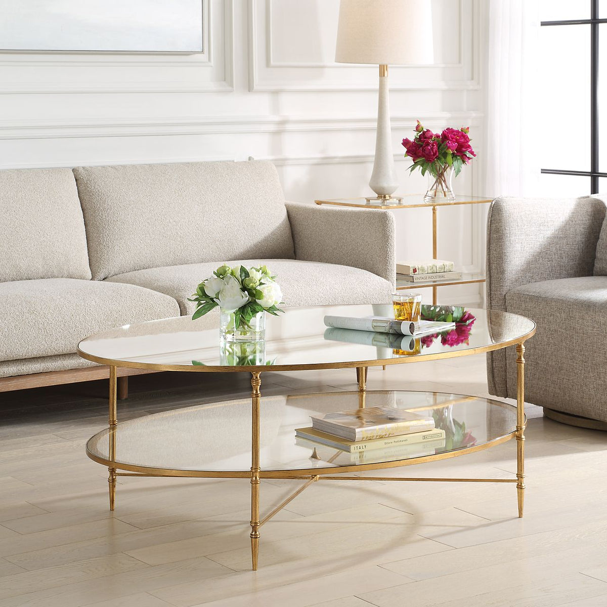 Henzler 93 W x 48 H x 134 D Gold Oval Coffee Table with Mirror Top Coffee Tables| Uttermost