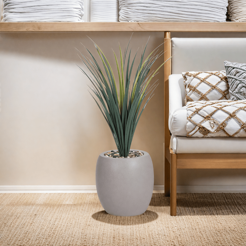 Yucca cactus tree with a fiberglass oval base consisting of a single branch, designed with green leaves that add a lively touch. Available colors: torabi spray. Artificial Plants| Otath