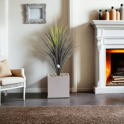 Yucca cactus tree with a square fiber pot consisting of a single branch, designed with green leaves that add a lively touch. Available colors: cement spray. - Al Rugaib Furniture