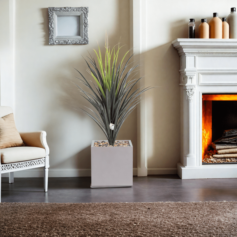 Yucca cactus tree with a square fiber pot consisting of a single branch, designed with green leaves that add a lively touch. Available colors: cement spray. - Al Rugaib Furniture