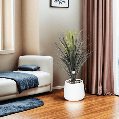 Yucca cactus tree with oval fiber pot consisting of a single branch, designed with green leaves that add a lively touch. Available colors: white - Al Rugaib Furniture