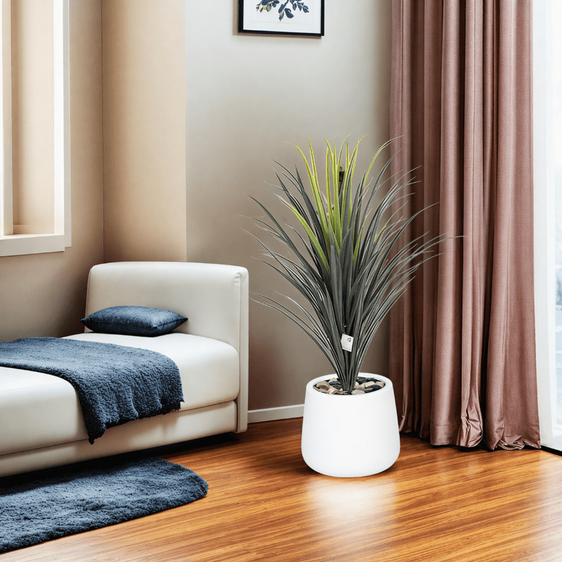 Yucca cactus tree with oval fiber pot consisting of a single branch, designed with green leaves that add a lively touch. Available colors: white - Al Rugaib Furniture