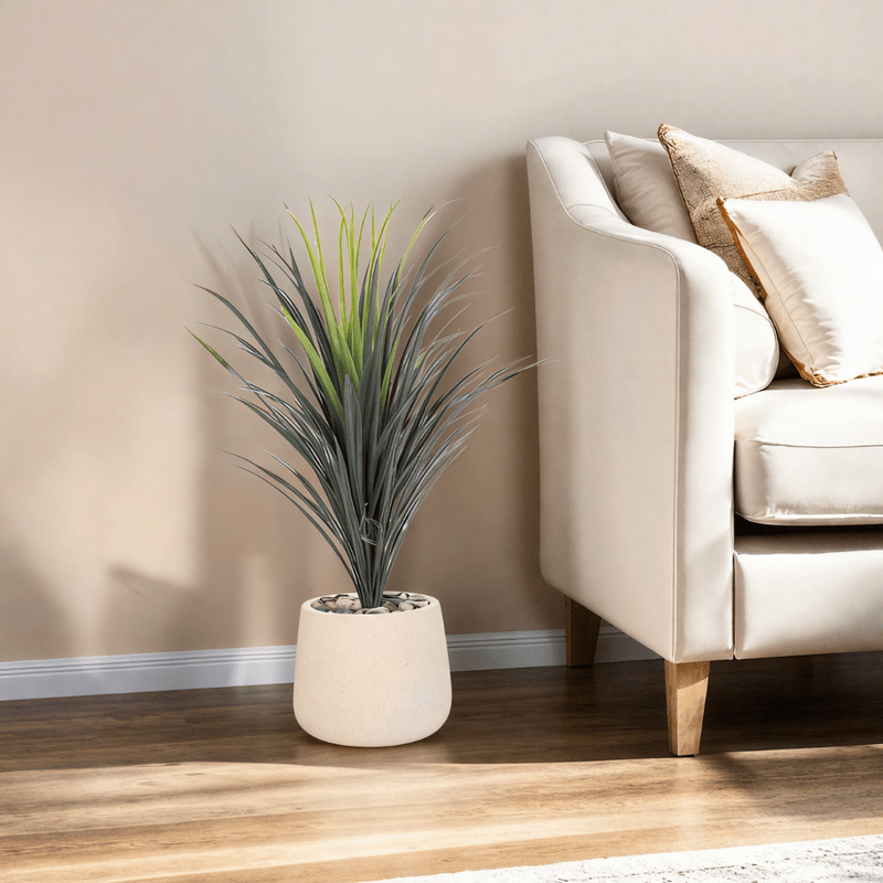 Yucca cactus tree with oval fiber pot consisting of a single branch, designed with green leaves that add a lively touch. Available colors:off white spray. Artificial Plants| Otath